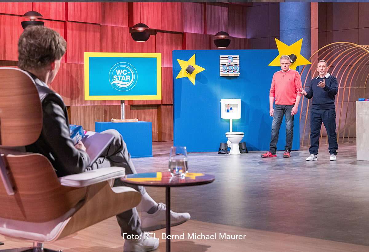 Die Gründer stehen vor der Jury.